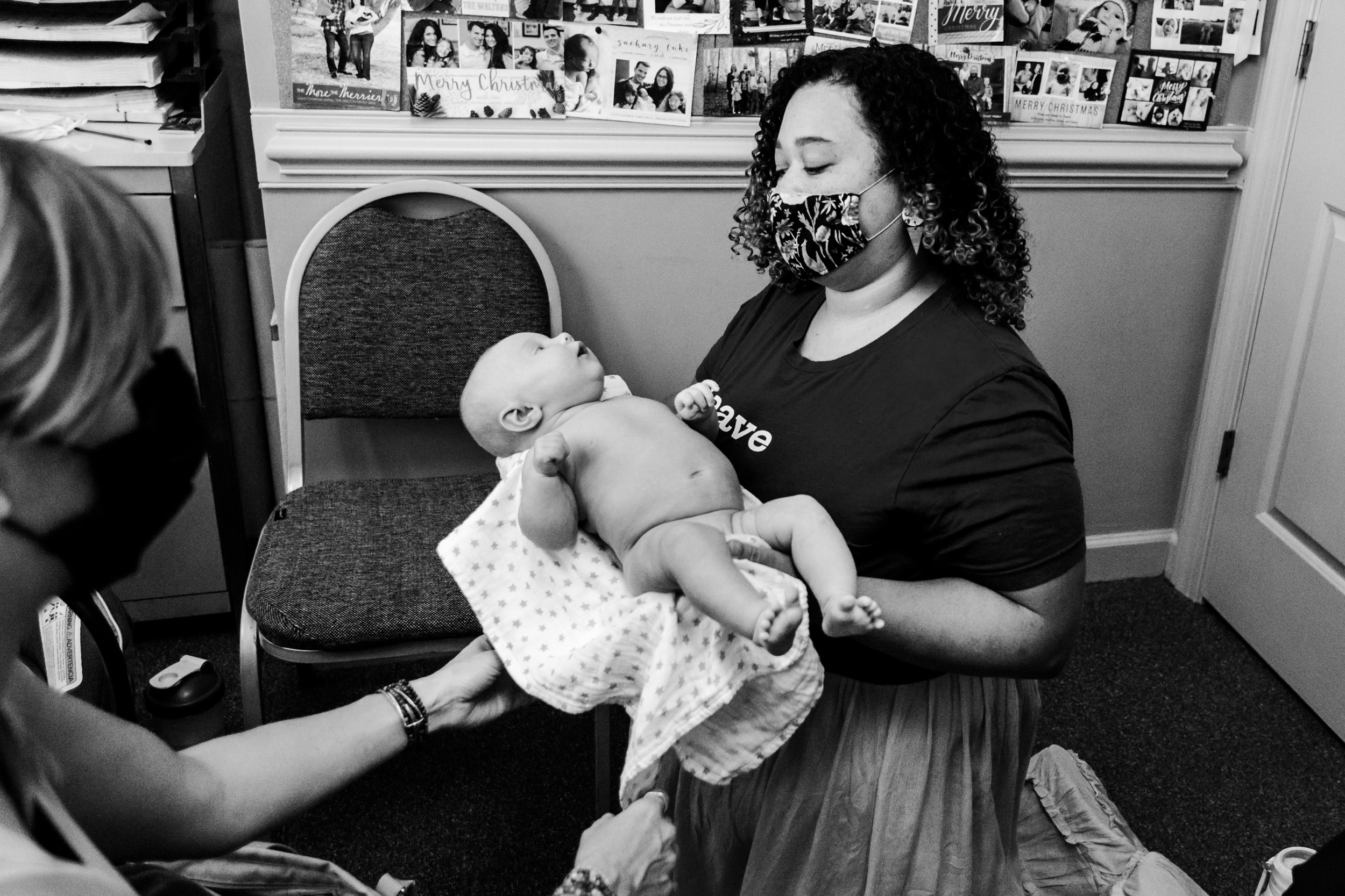 midwifery office visit, #internationalmidwiferyweek, student midwife holding baby